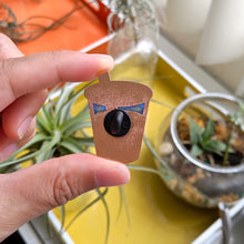 Load image into Gallery viewer, Backside of the pin, showcasing the translucence